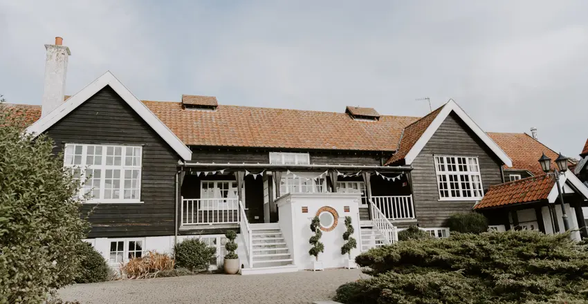 Exterior of Thorpeness Country Club, wedding venue in Suffolk