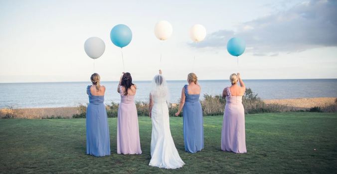 Thorpeness Country Club, Bridal party on beach front lawn holding balloons