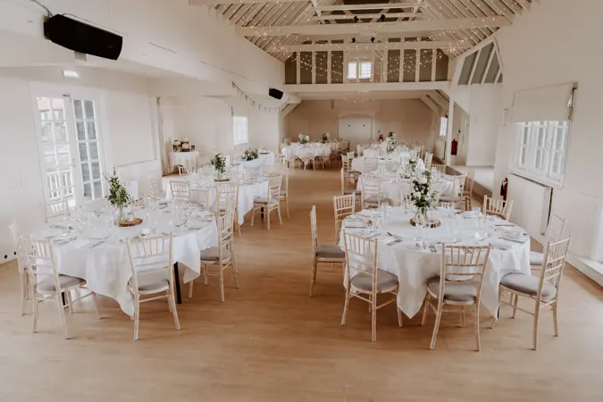 Tables set up for wedding breakfast