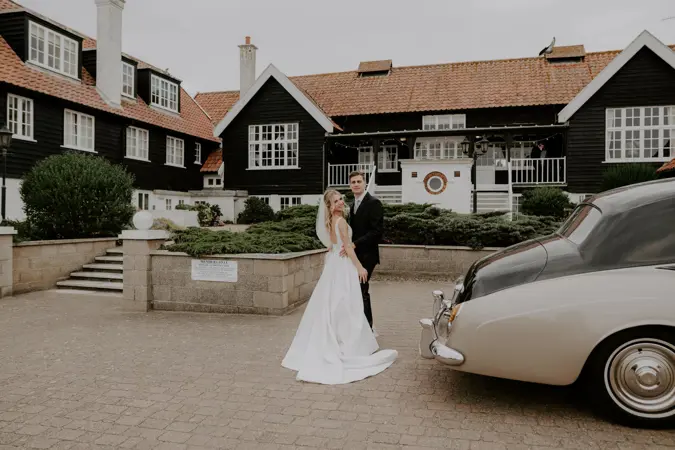 Couple outside Thorpeness Country Club
