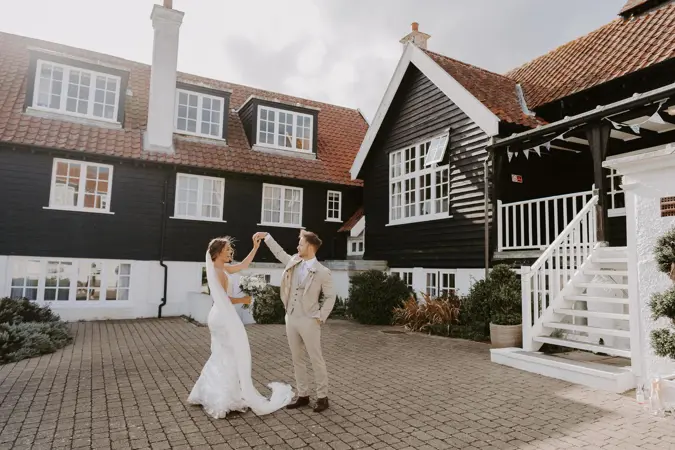 Couple dancing in front of Thorpeness Country Club