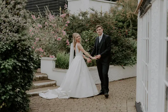 Bride and Groom holding each other
