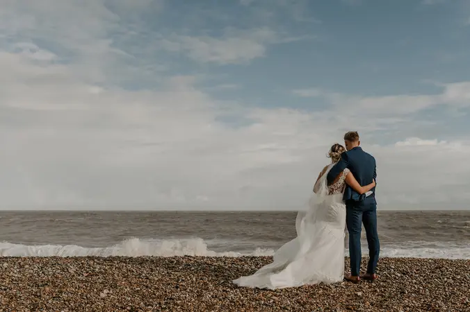 Couple hugging on the beach